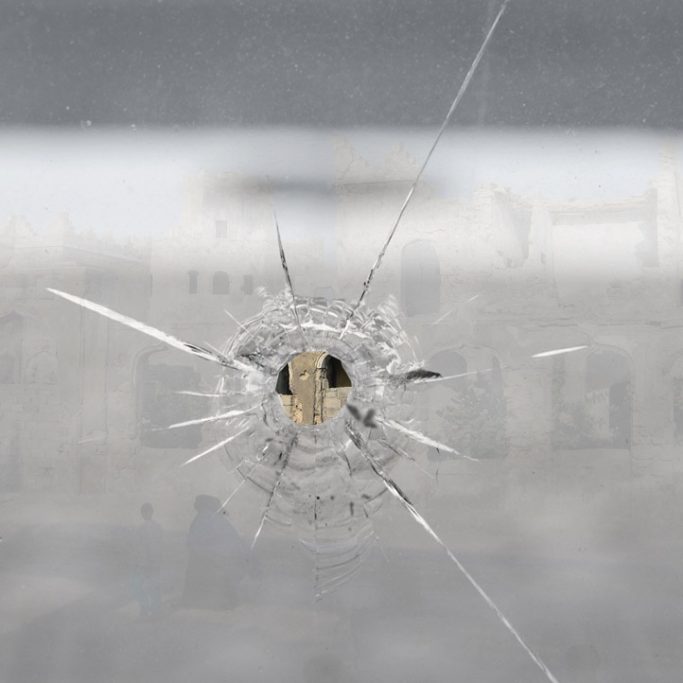 Bullet hole in window