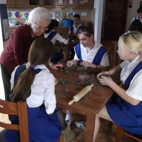 Esther Augsburger in a pottery class in Albania