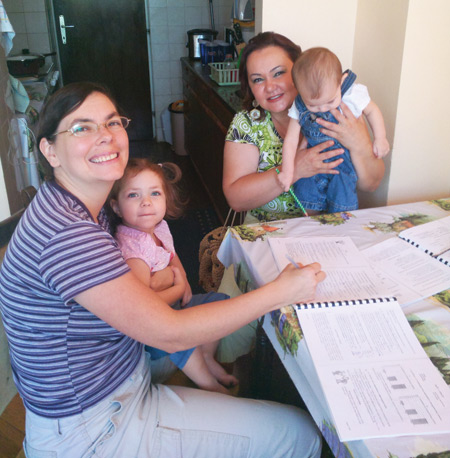 Laura Campbell (left) with Ruth, language tutor Vera with Esther Campbell. Photo courtesy of author