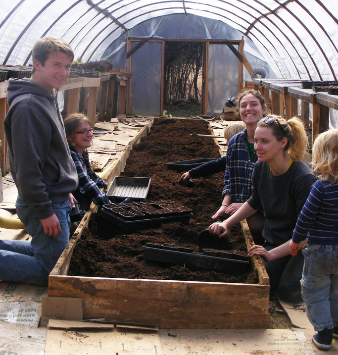 Friends enjoy planting seeds in the OCF greenhouse. Photos courtesy of author