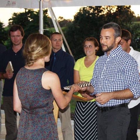 Martin Rhodes presents gifts to the new tranSend class