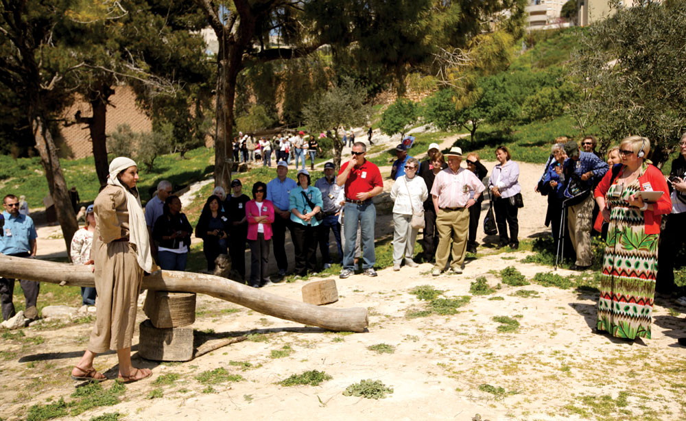 A guide in first century clothing shares stories from the life and times of Jesus at  Nazareth Village. Photo courtesy of Elsa Miller