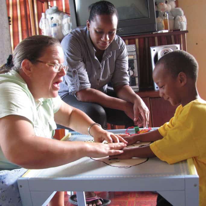 Nancy Marshall teaches a Deaf student