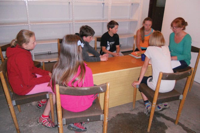 Emily Gingrich (right) with students at Family English Camp. Courtesy of author