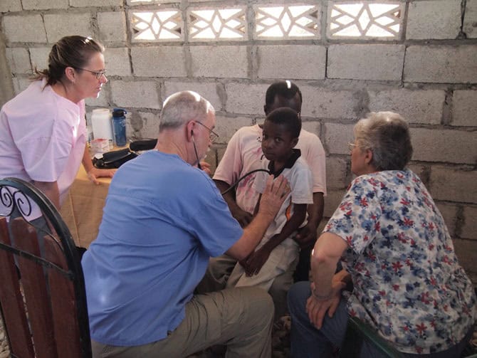 Several members of the medical team see patients in Haiti.