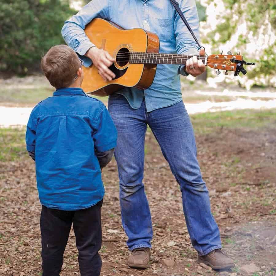 VMMissions worker Raleigh, with his son Robbie (names changed) sings and plays his guitar. Courtesy photo